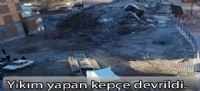 Yıkım yapan kepçe devrildi