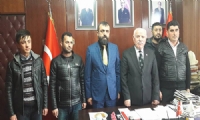 İhsan Akın, Milliyetçi Hareket Partisi İl Başkanı Mehmet Erdem'i ziyaret etti.