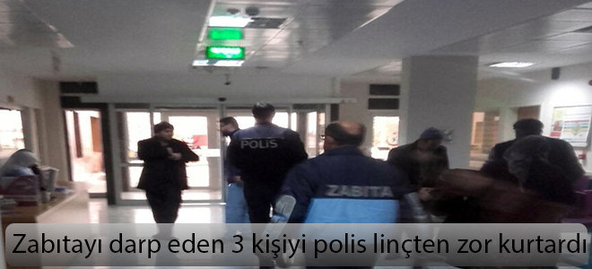 Zabıtayı darp eden 3 kişiyi polis linçten zor kurtardı